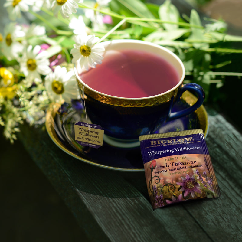 Cup of Whispering Wildflowers Plus L-Theanine Herbal Tea with box and foil packet